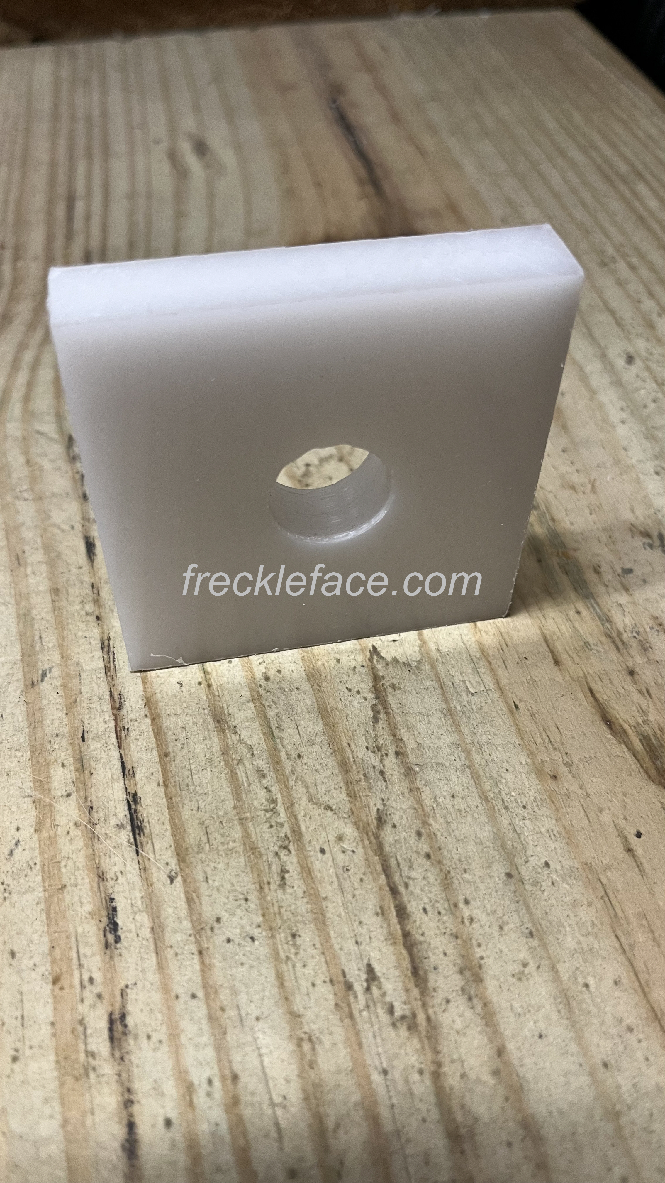 spacer for deck to wall